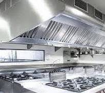 A Kitchen With A Range Hood